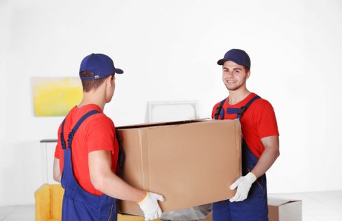 Removal team planning a move in Finsbury Park near residential flats