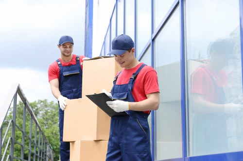 Furniture pick-up team handling bulky household items in Finsbury Park