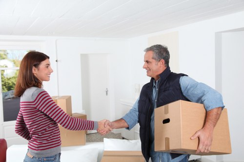 Packed boxes and moving van for residential transport in North London