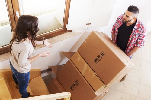 Commercial removals vehicle loading business items carefully