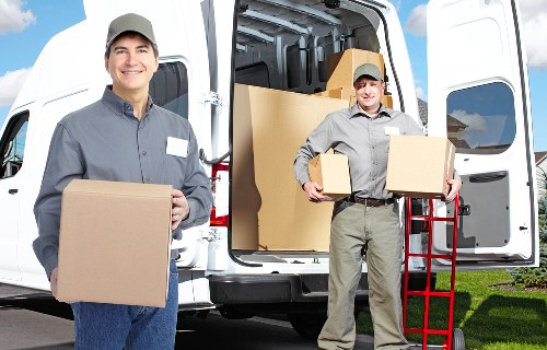 Packed boxes and furniture ready for a local house move