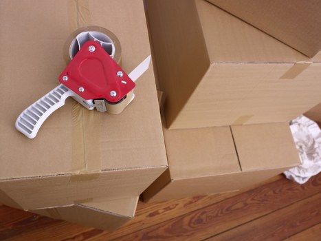 Local moving van helping with furniture transport in North London