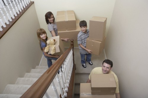 Careful handling of boxes and household items by a local moving team